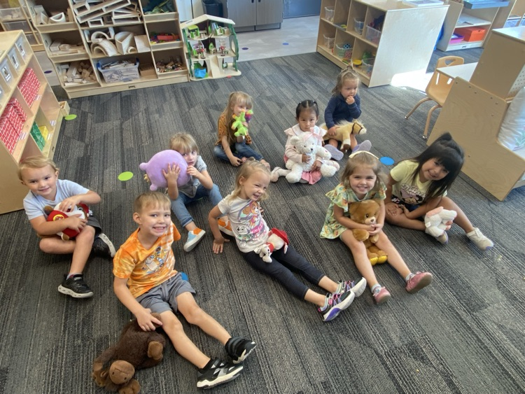 preschool children with their stuffies
