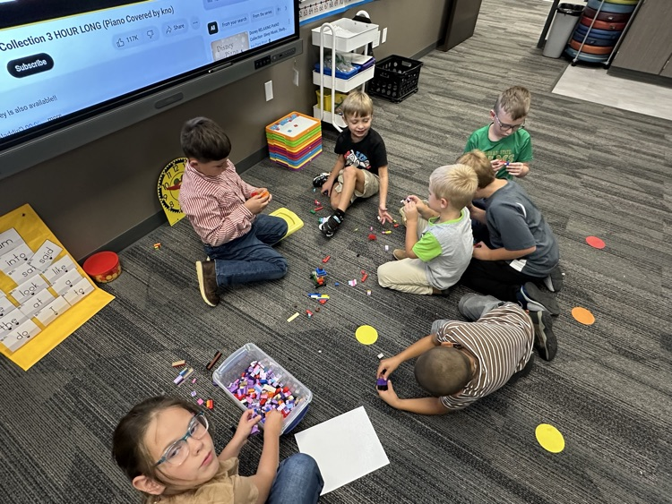 Students building with legos
