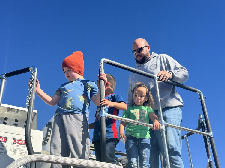 students exploring the fire truck