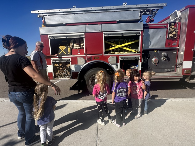 students exploring the fire truck