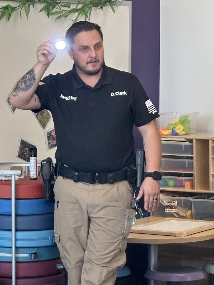 Deputy Clark demonstrating how his flashlight works