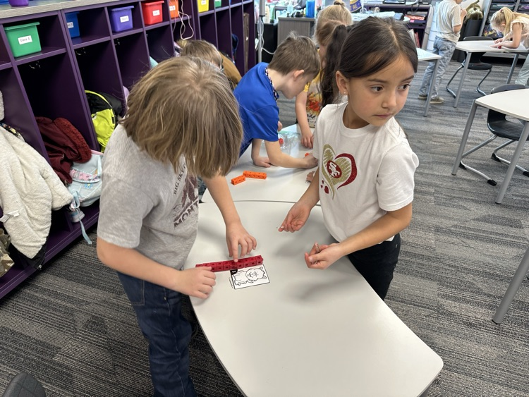 Measuring objects in the classroom using paper clips and blocks