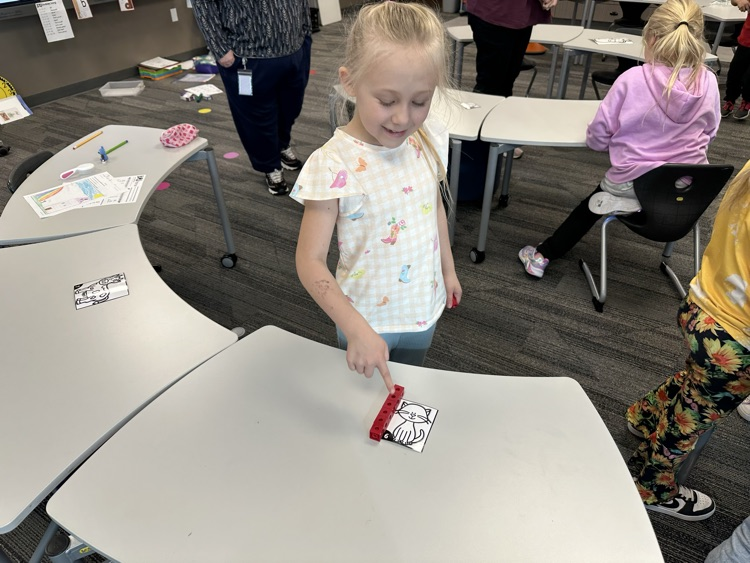Measuring objects in the classroom using paper clips and blocks
