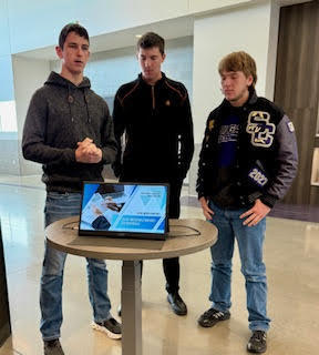 Noah, Josh & Levi presenting using the portable monitor