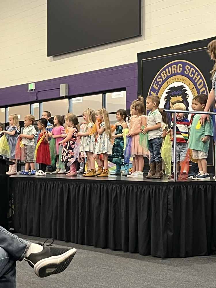 students on stage for preschool program