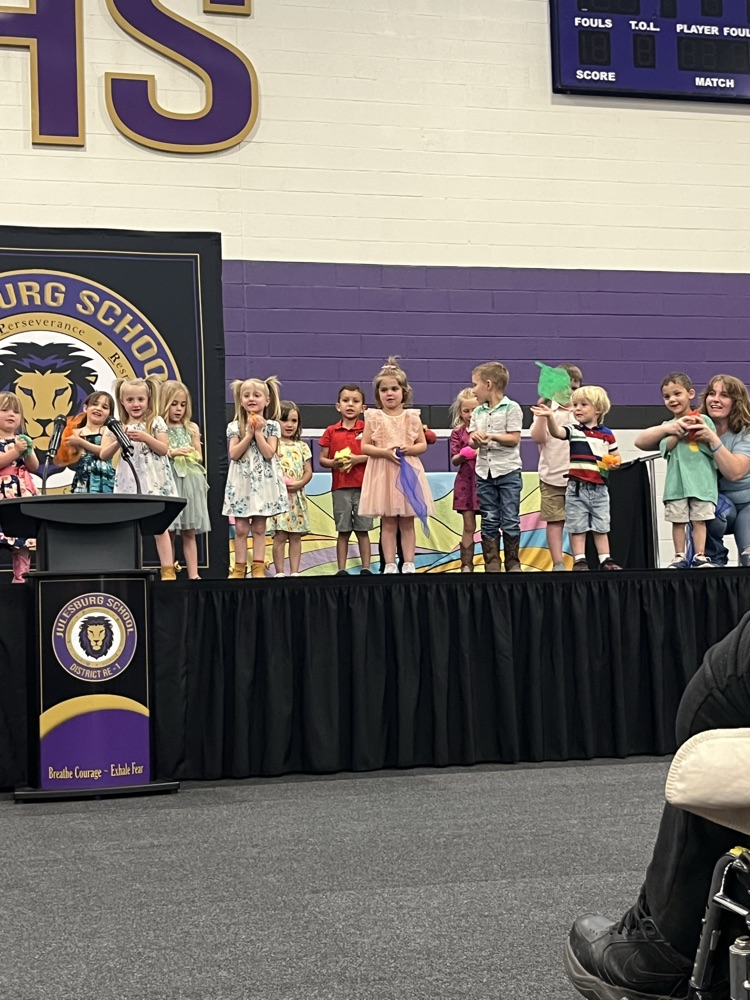 students on stage for preschool program