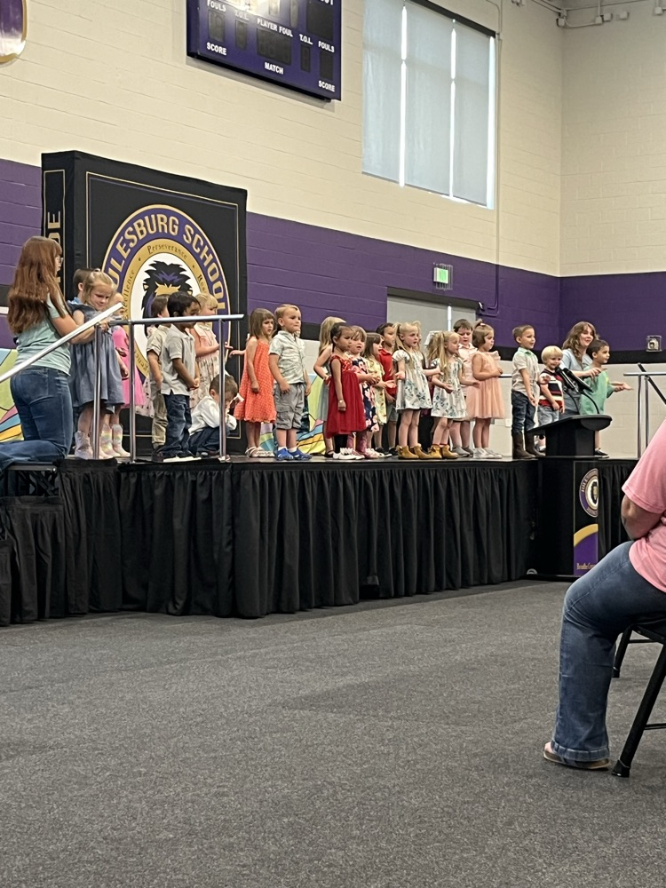 students on stage for preschool program