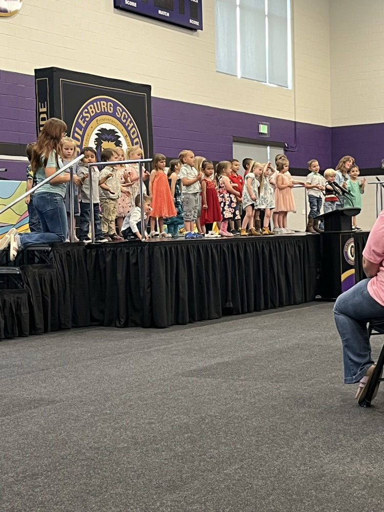 students on stage for preschool program