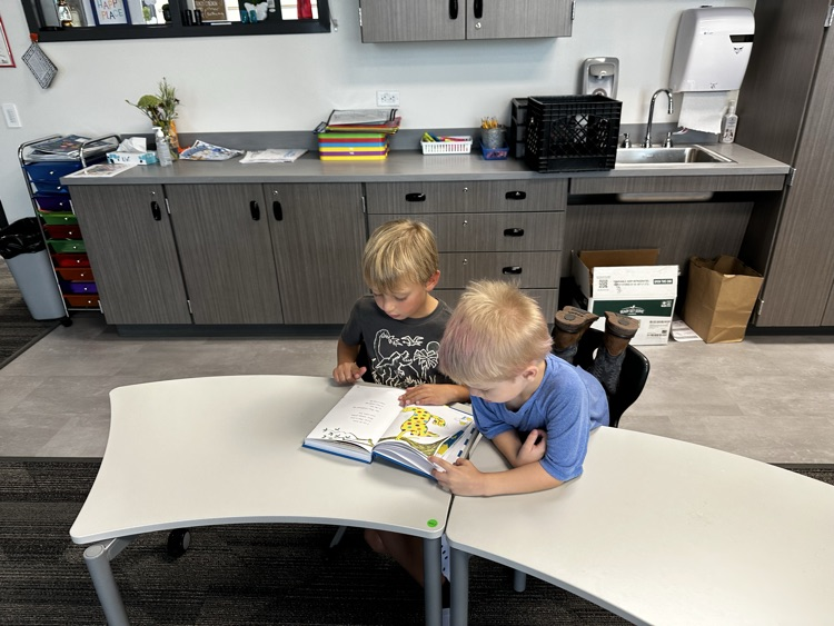 Reading with a buddy.