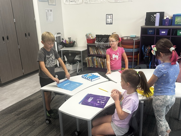 Practicing spelling words with paint. 