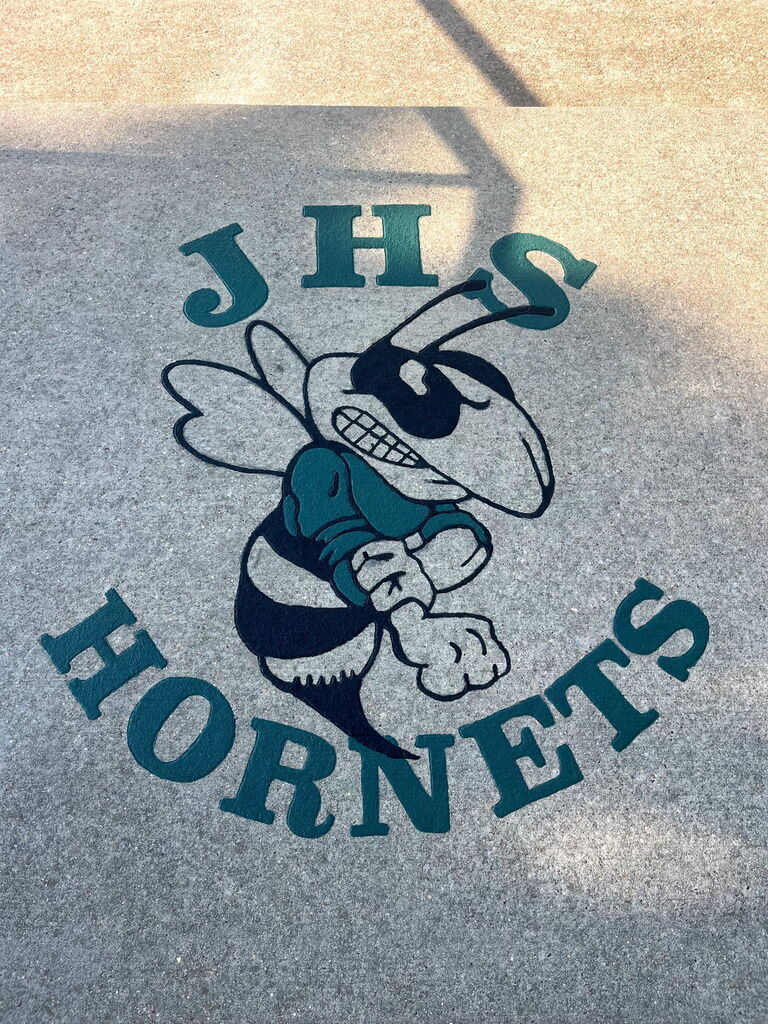 A sidewalk painting of our Hornets logo. Found near the ball fields.