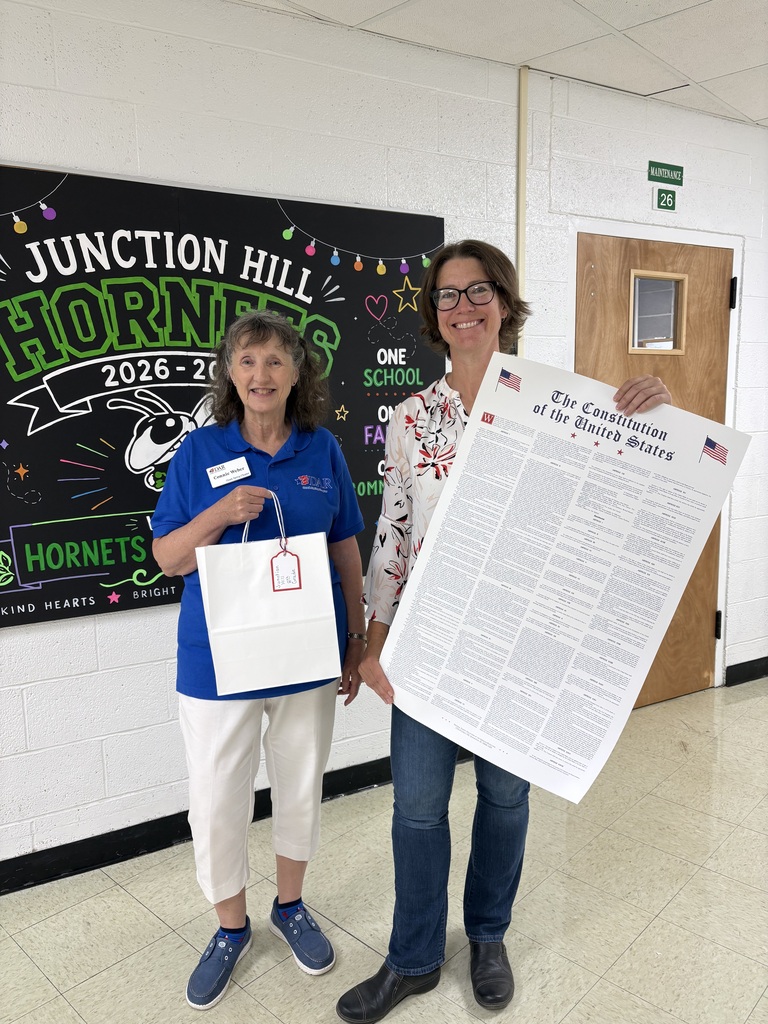 Mrs. Gendron accepts donations from the Daughters of the American Revolution