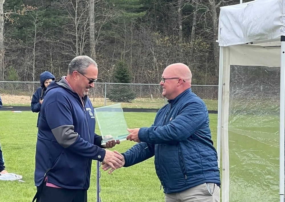 Mr. Kemler shakes hands 
