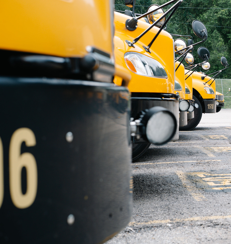 school buses lined up at the south charleston bus garage.