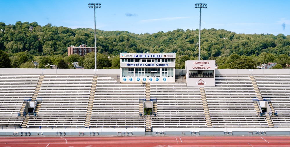 Empty stands at Laidley Field.  At the top of the stands is the Laidley Field press box and the UC box suite.