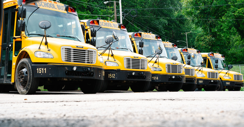 school buses lined up at the south charleston bus garage.