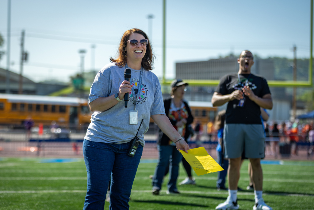 kcs asst. superintendent of exceptional students speaking to the crowd during the opening ceremony of the exceptional spring games.
