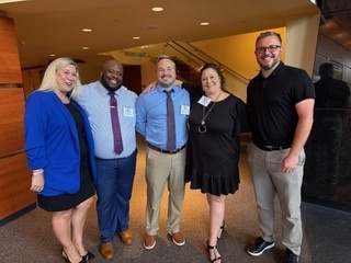 kcs teachers and administrators at the ron clark dinner at the clay center.