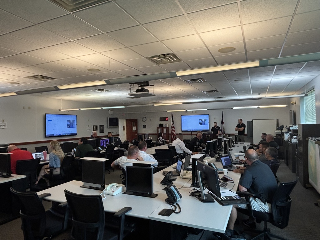 law enforcement officers and metro 911 personnel being trained on the new camera system in kanawha county schools. 