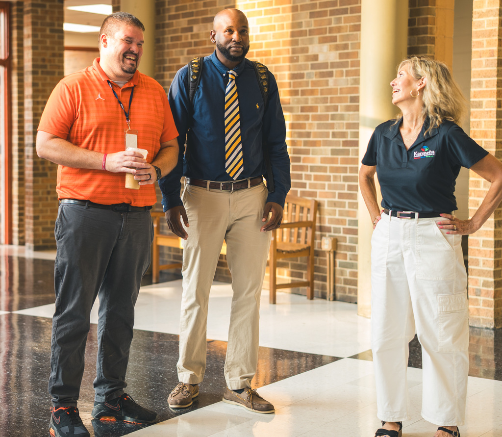 south charleston high school principal, dupont middle school vp, and missy ruddle laughing in the hallway