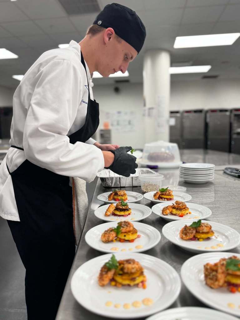 Zach preparing his dish