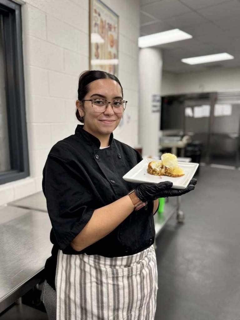 Chef Cydney with her dessert