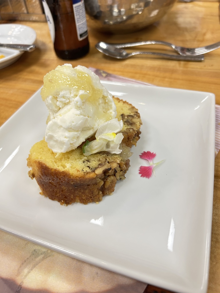 Golden Walnut Rum Cake Piña Colada Super Premium Ice Cream Pineapple Sauce Topping