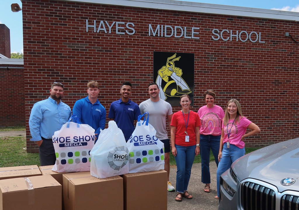 Kids of Kanawha donating shoes to kcs schools.