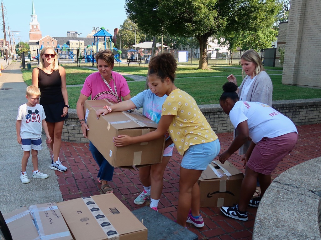 Kids of Kanawha donating shoes to kcs schools.