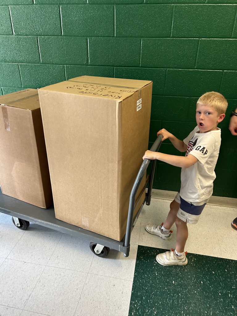 Kids of Kanawha donating shoes to kcs schools.