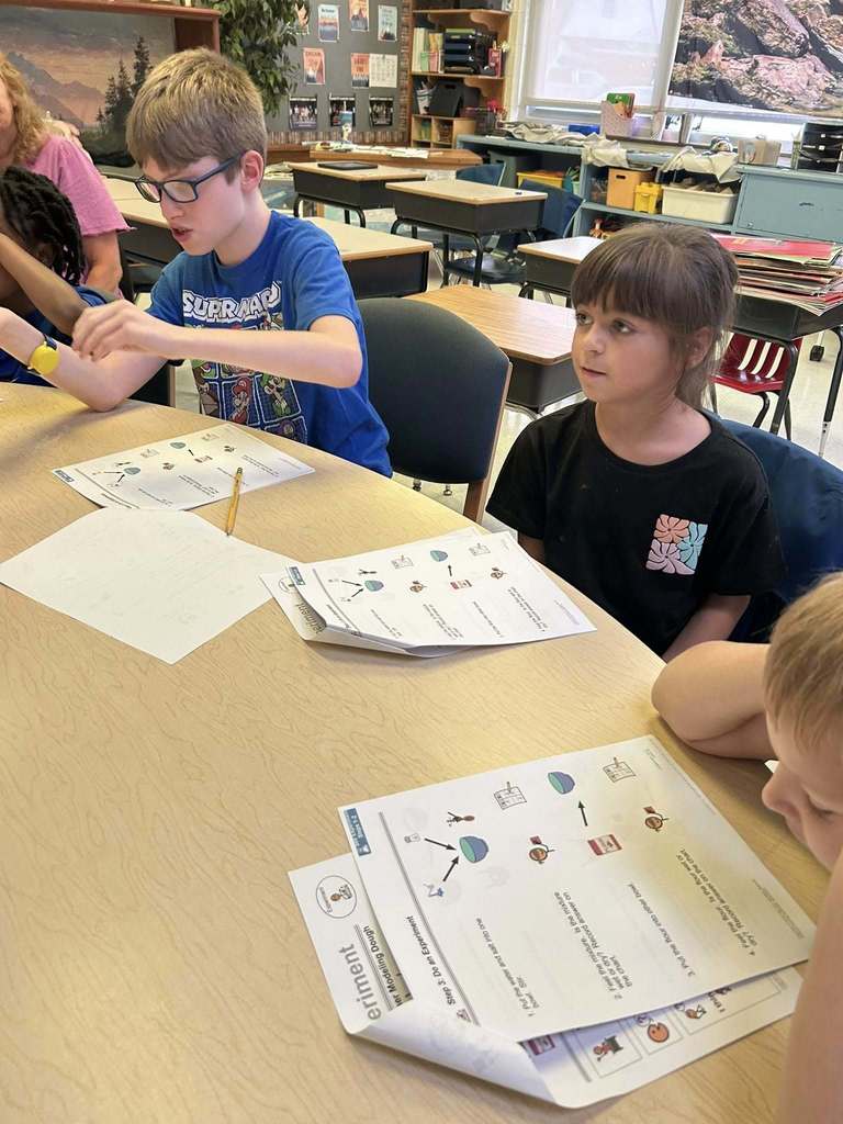students at kanawha city elementary making their own playdoh during science class.
