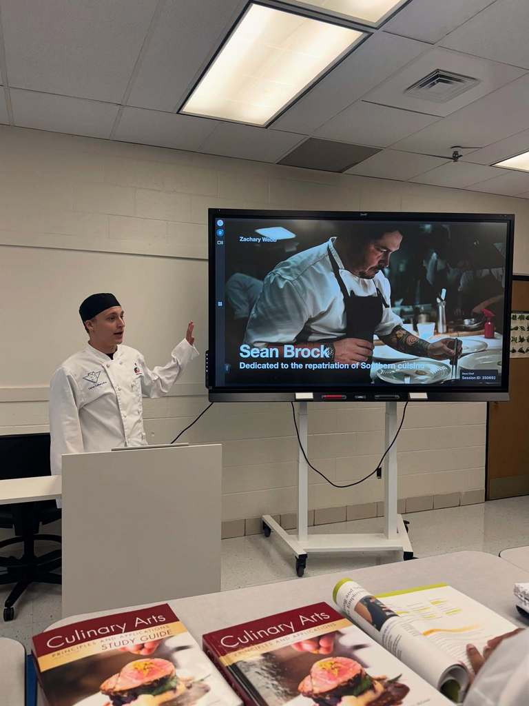 carver culinary students presenting their research on world famous chefs.