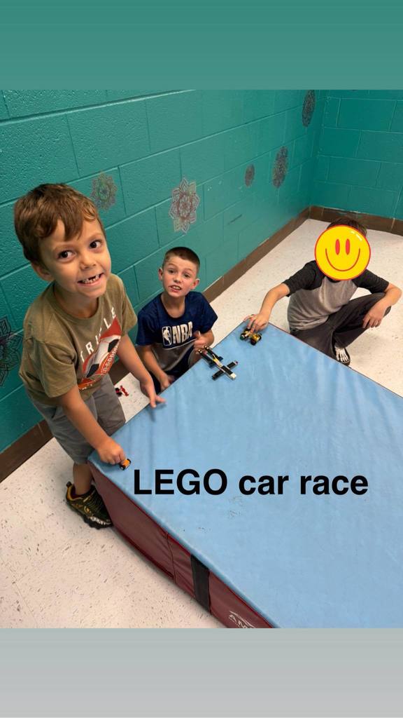 students getting ready to race their lego cars. 