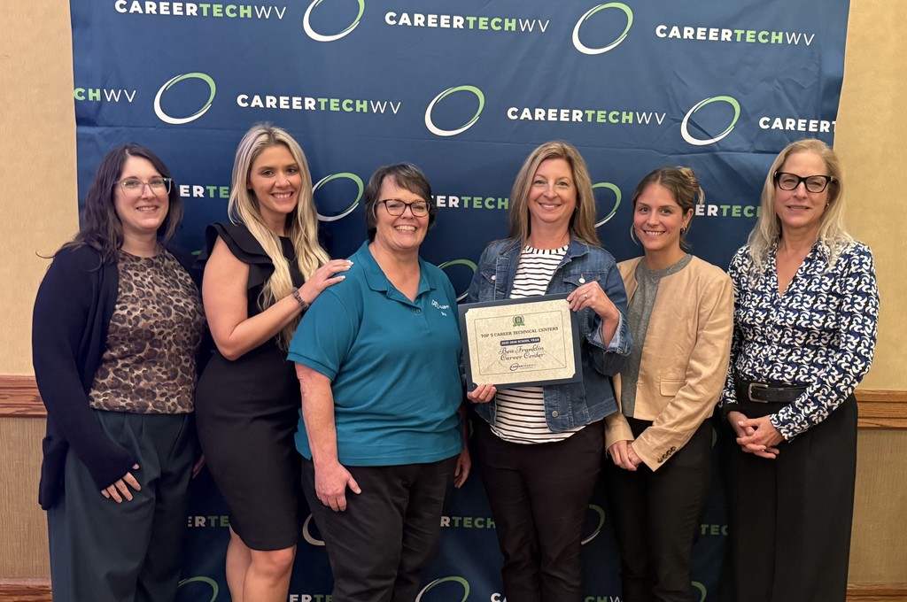 staff from ben franklin career center posing with their award for being named the top cte center in west virginia. 