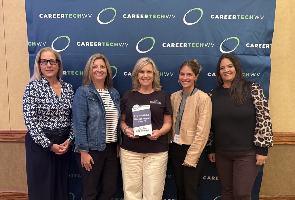 KCS cte staff posing with the class IV pinnacle award.
