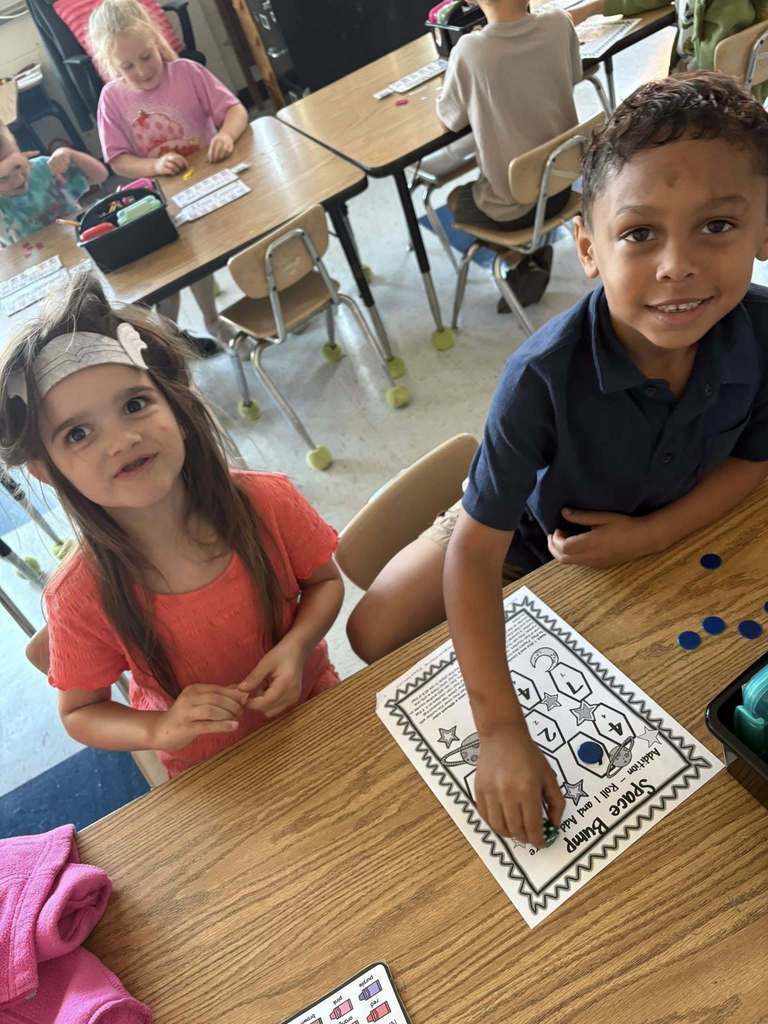 two bridgeview elementary kindergarten students working together during a math lesson. 