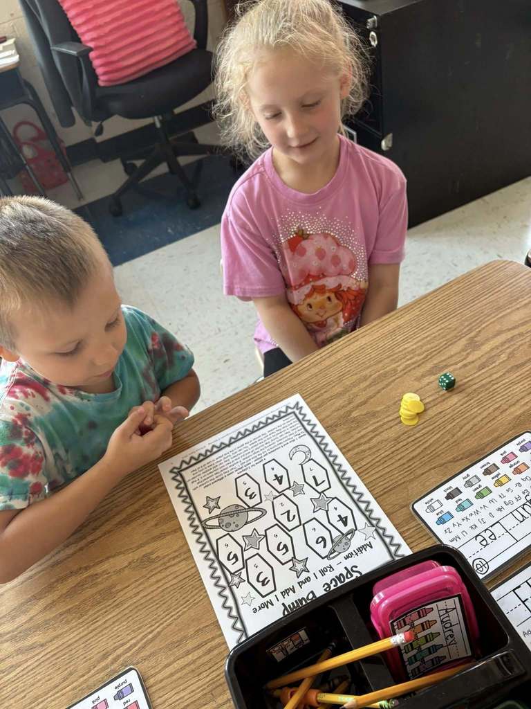 two bridgeview elementary kindergarten students working together during a math lesson. 