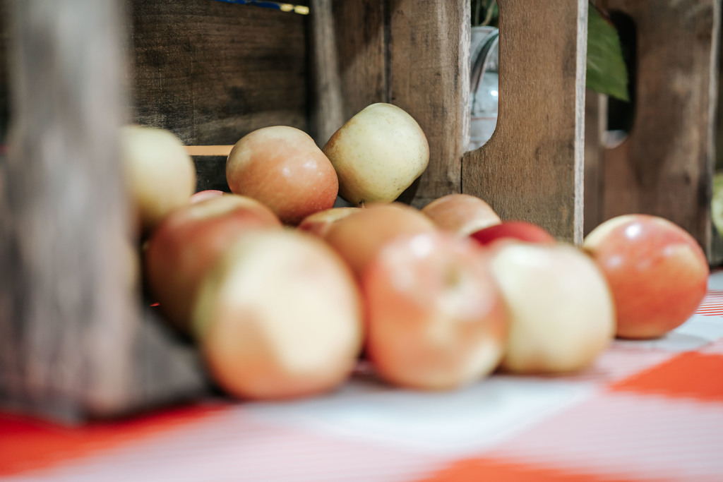 wv grown apples sitting in a crate at the farmers market event at malden elementary.