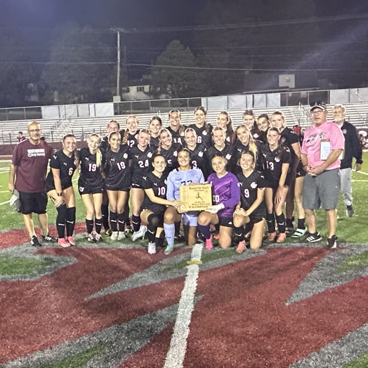 girls soccer in a group