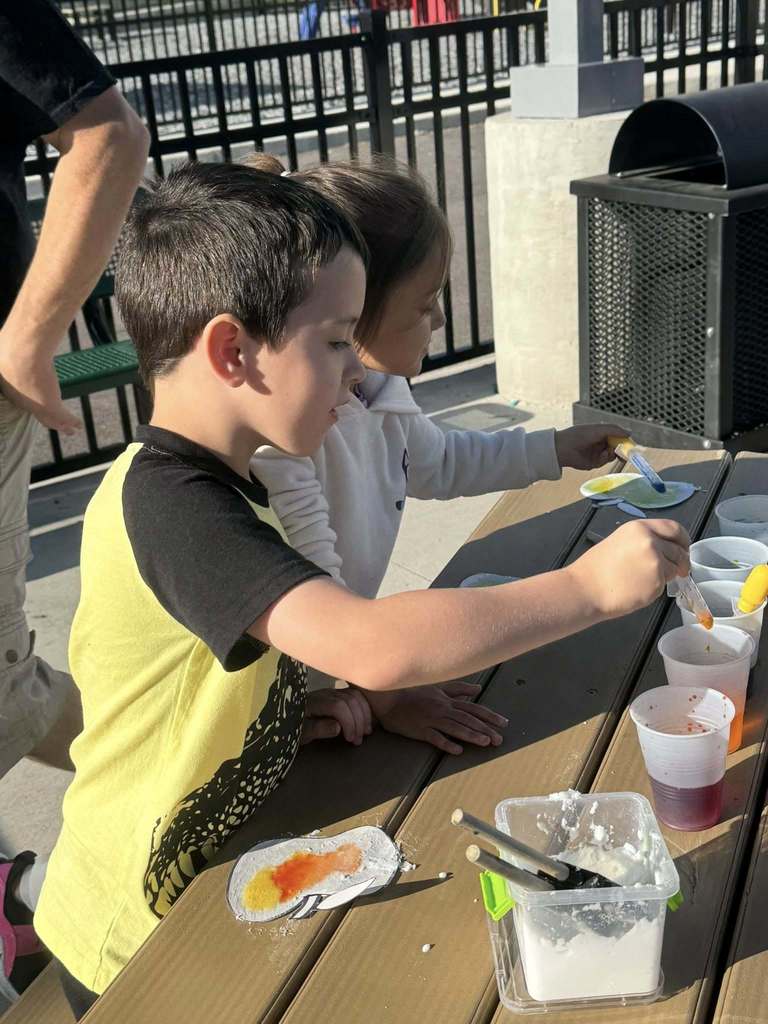 students at cedar grove elementary use droppers during a stem lesson at cedar grove elementary.