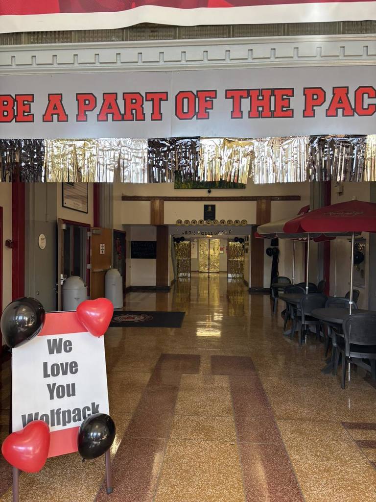 the entrance at west side middle school decorated for homecoming week.