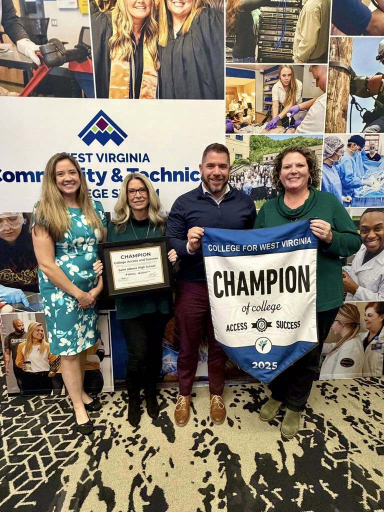 St. Albans High School Counselors accepting their award as a Champion of College Access and Success.