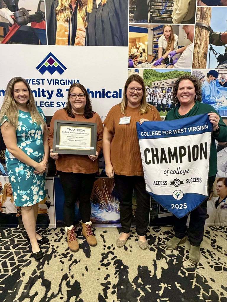 Riverside  High School Counselors accepting their award as a Champion of College Access and Success.