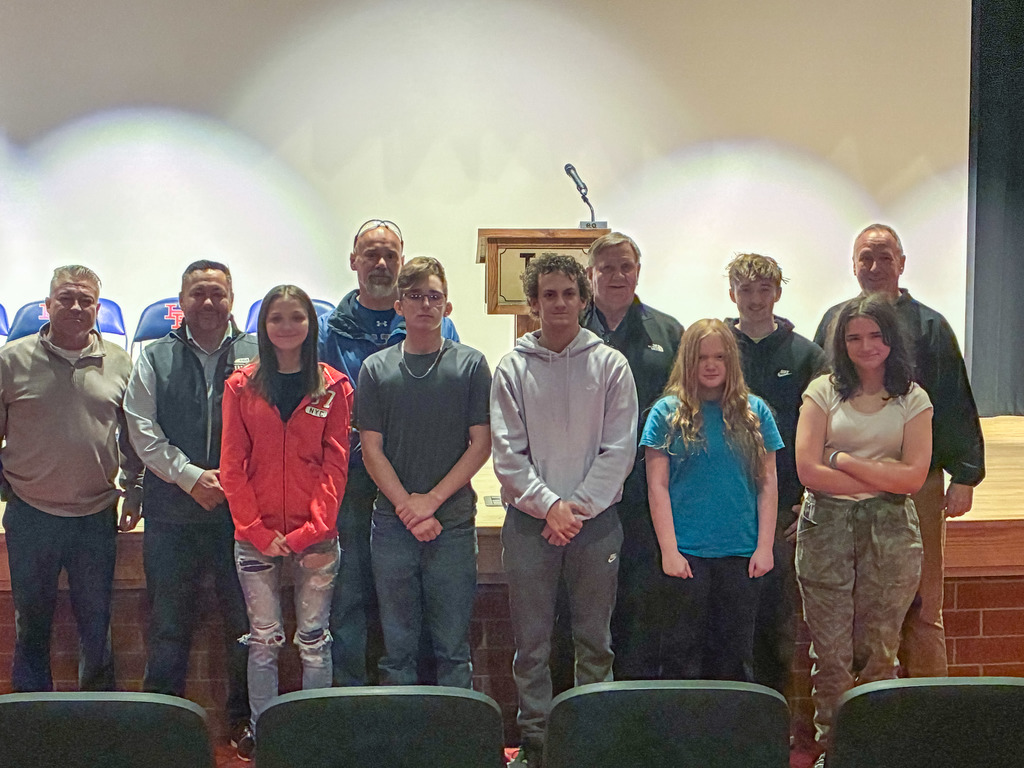 herbert hoover shop students posing for a picture in the school's auditorium with their teacher, principal, contractor jerry hinzman, kcsboe member mike arbogast,  and wv house of delegate member dean jeffries.