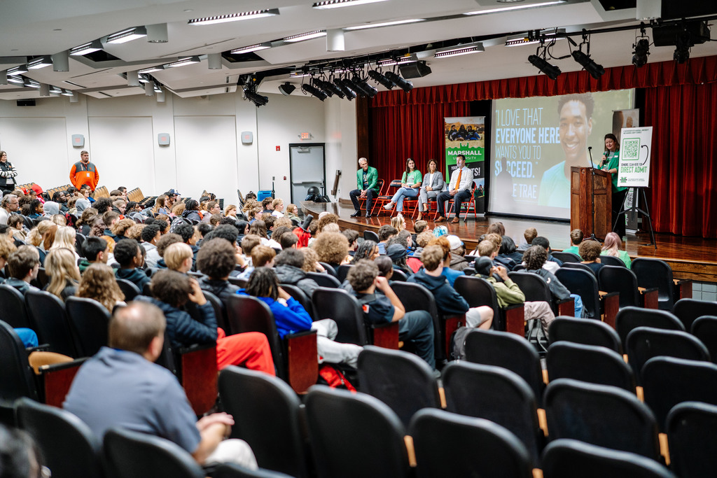 south charleston high school students sitting in the auditorium and representatives from marshall university speak with them about the direct admit partnership with KCS.