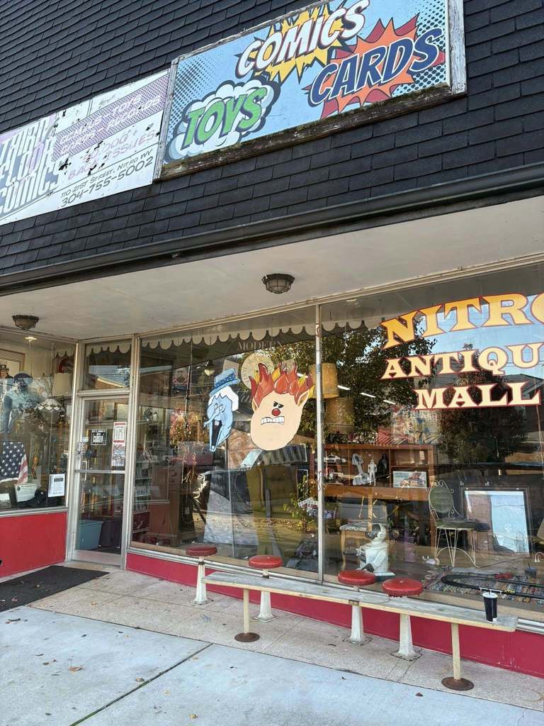 nitro antique mall with a christmas theme window display painted by art students at nitro high school.