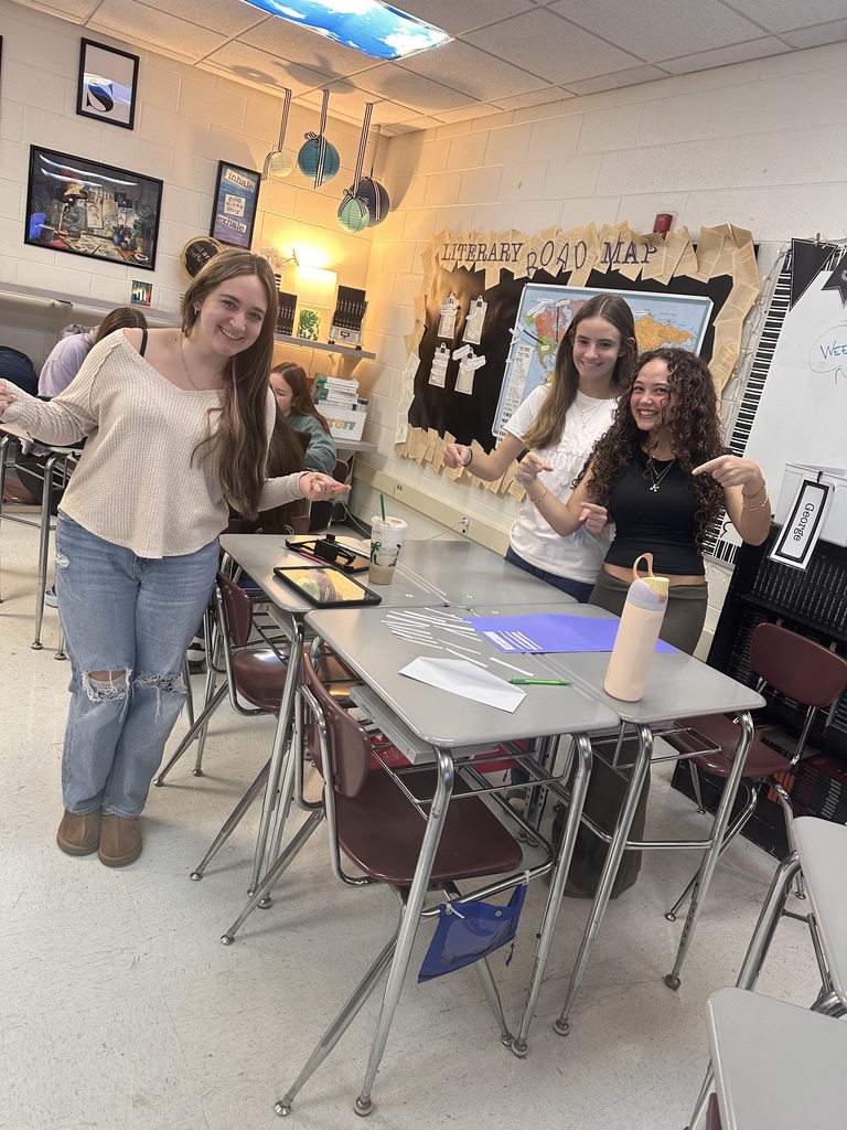 students in a group doing poetry activity