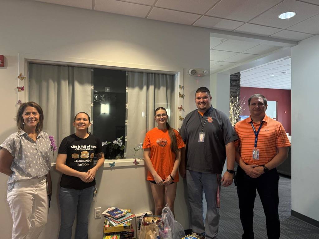 South Charleston high school students and staff, along with KCS superintendent Dr. Paula Potter, pose for a picture at the Ronald McDonald House after donating supplies there.