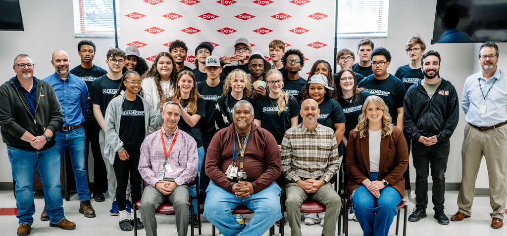 A large group photo of the SCHS students in the program along with Dow employees who serve has mentors for the program.