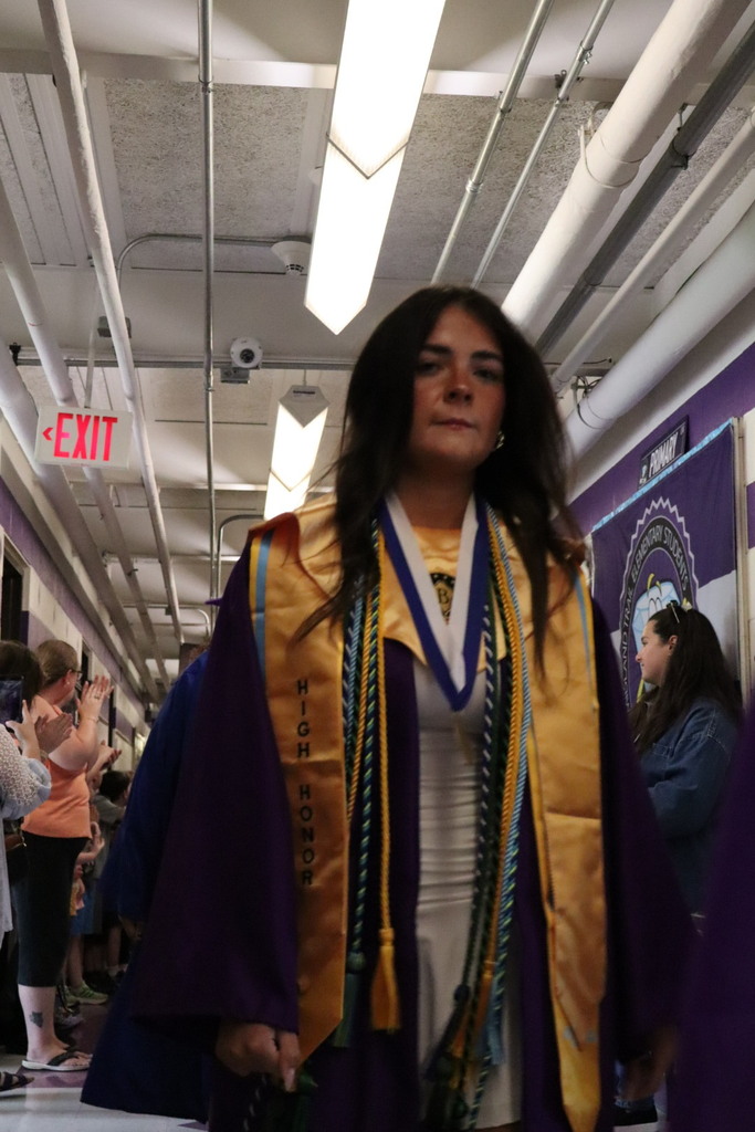 Students walking in hallway.
